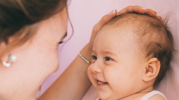 Babies can tell if you’re smiling