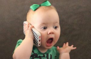CUTE babies talking on the phone